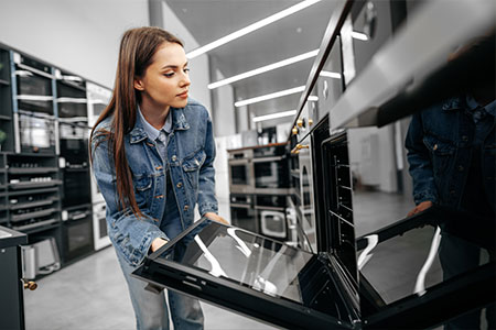 consumer looking at appliance